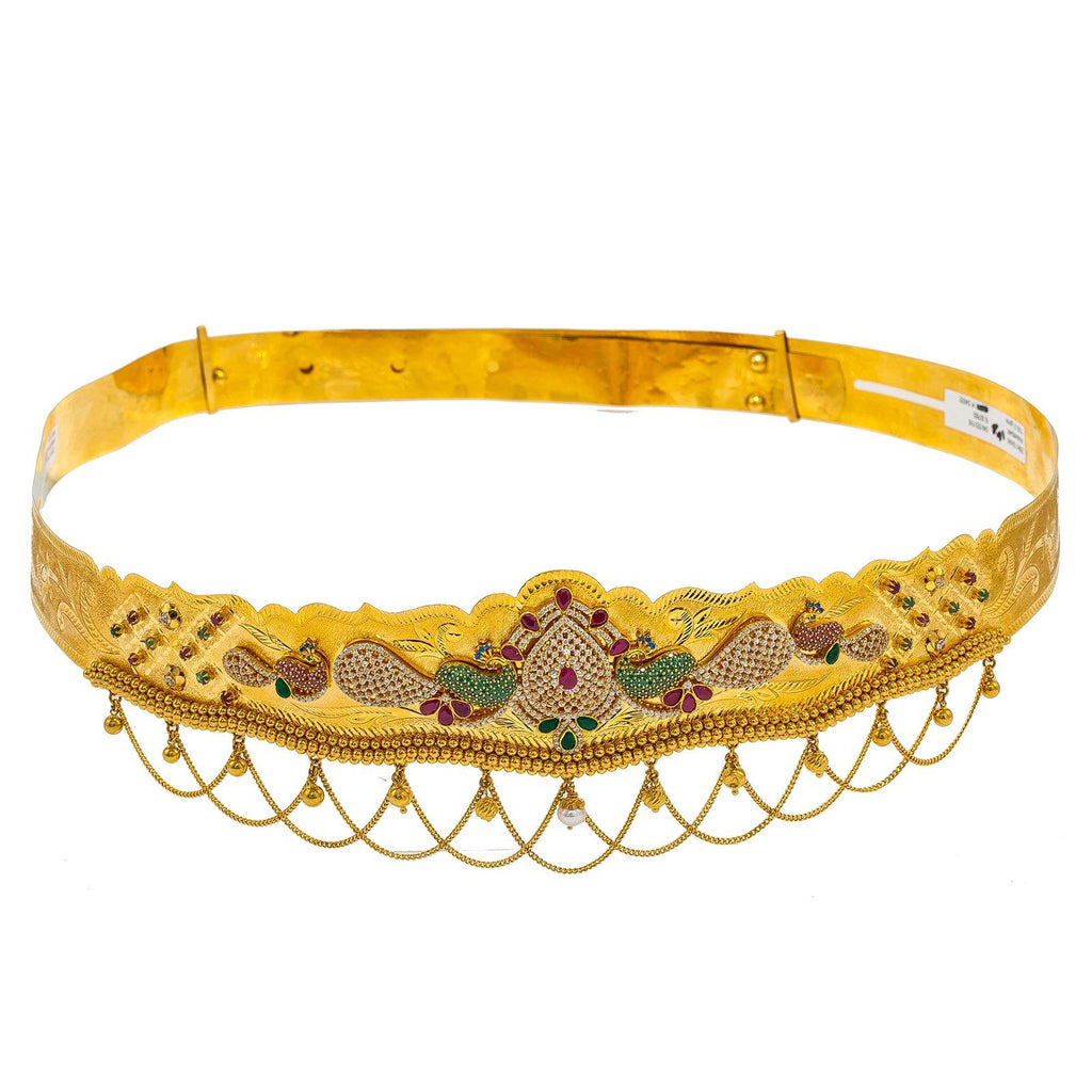 22K Yellow Gold Vaddanam Waist Belt W/ Ruby, Sapphire, CZ Gems & Teardrop Peacocks Pendant - Virani Jewelers |
Add the brilliance of 22K and precious gemstones to your wardrobe with this 22K gold Indian w...