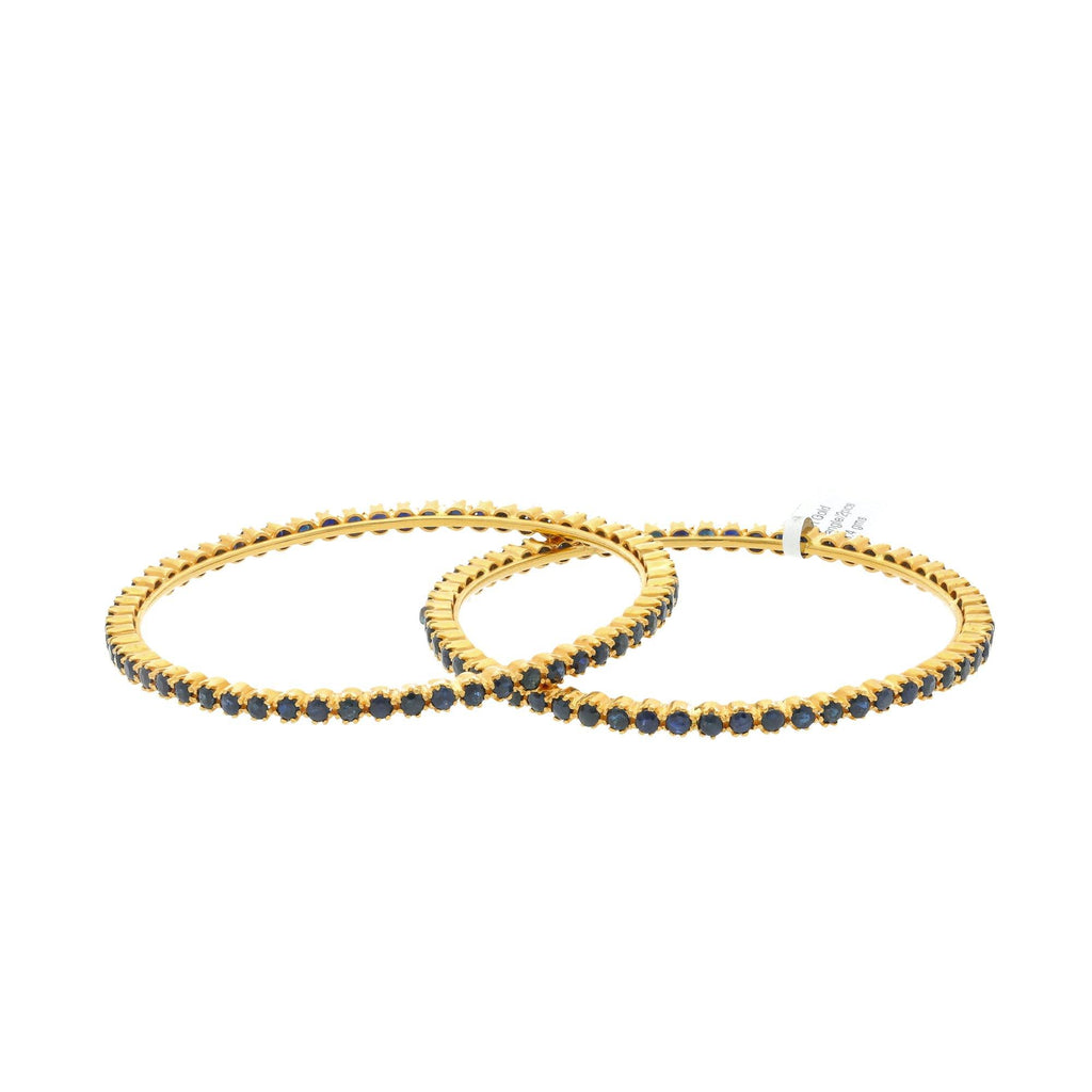 22K Yellow Gold Bangles Set of Two W/ Sapphire, 38.4 grams - Virani Jewelers | Supporting an interesting mix of modern and traditional styles, these 22K gold sapphire bangles w...