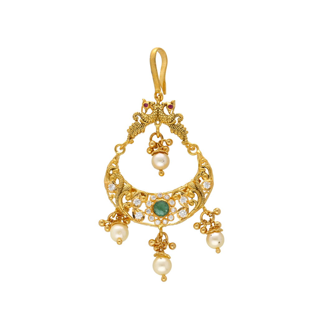 22K Yellow Gold Tikka w/ Gemstones and Pearls (10.5gm) |
This gleaming 22k gold tikka has a chandbali like designed decorated with a rich array gemstones...
