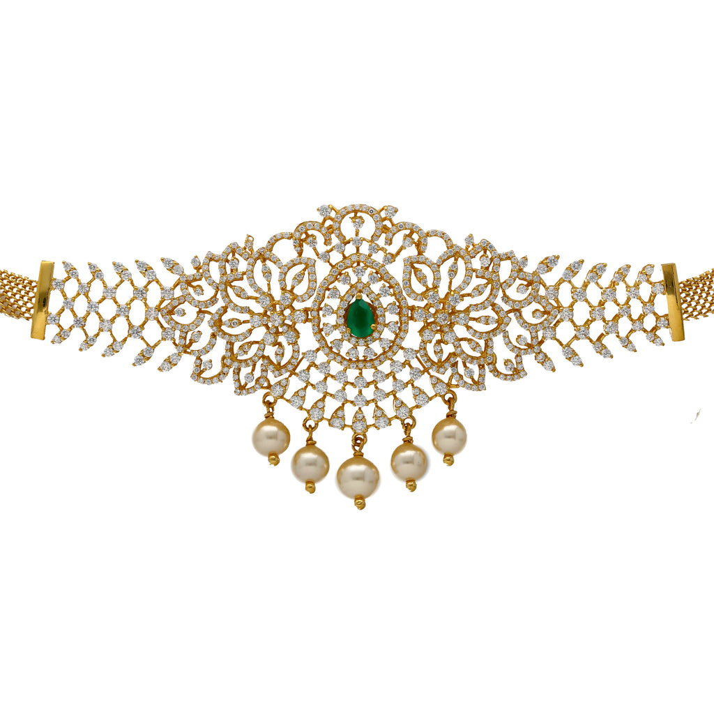 22K Yellow Gold, Ruby & CZ Choker (42.3gm) |
This luxurious 22k yellow gold choker necklace has cz stones, pearls, and rubies embedded into...