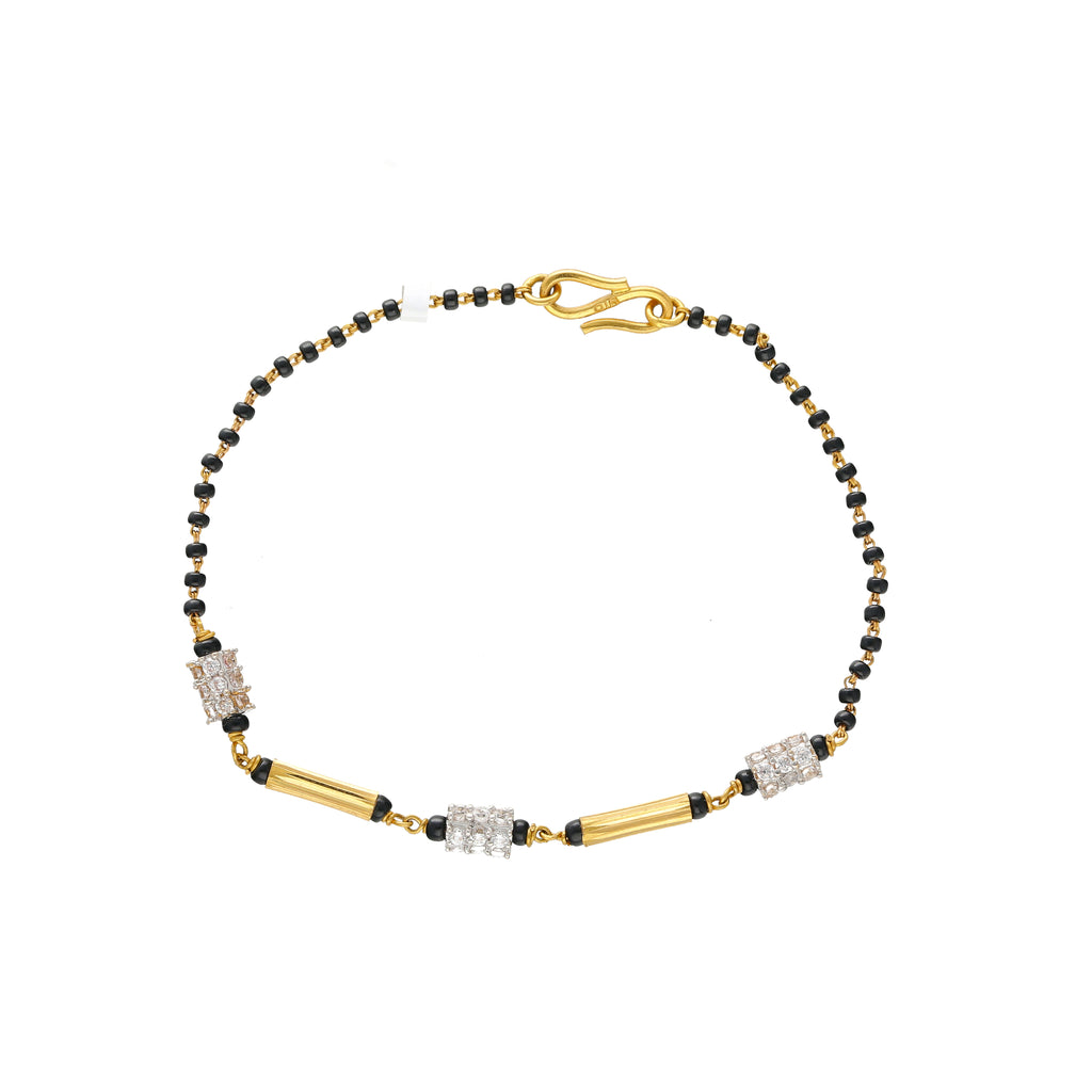 22K Multi-Tone Gold Beaded Bracelet (4.1gm) |
Adding this minimal 22k Indian gold bracelet to your wrist will bring a layer of sophisticatio...