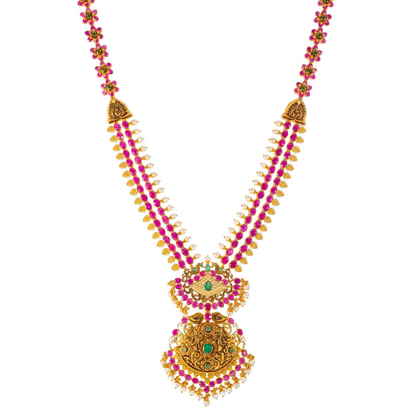 22k Yellow Gold, Emerald, Ruby, & Pearl Temple Necklace Set  (132.2gm) | 


Embrace the air of cultural sophistication with this beautiful 22k gold necklace and Jhumki ea...