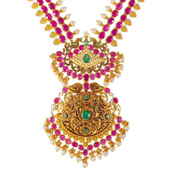 22k Yellow Gold, Emerald, Ruby, & Pearl Temple Necklace Set  (132.2gm) | 


Embrace the air of cultural sophistication with this beautiful 22k gold necklace and Jhumki ea...