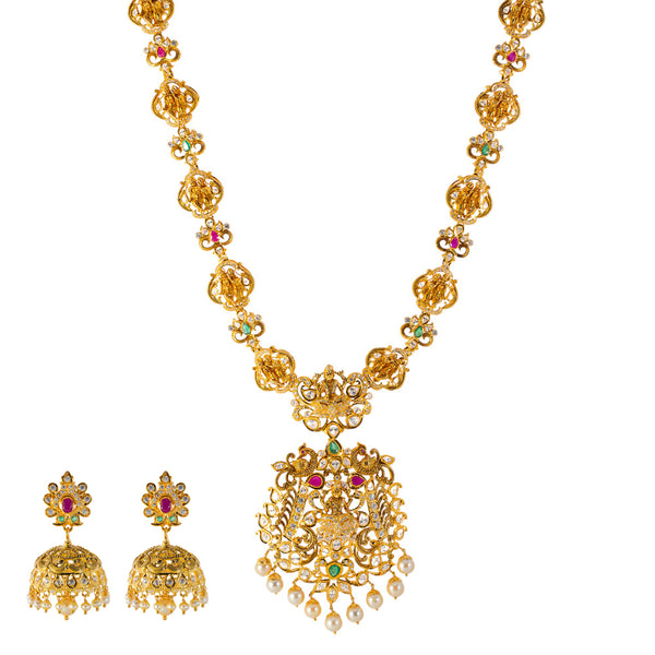 22k Yellow Gold Temple Necklace Set  w/ Gemstones & Pearls (136.7gm) | 


Experience the opulent harmony of traditionalism and beauty with this 22k gold necklace and ea...