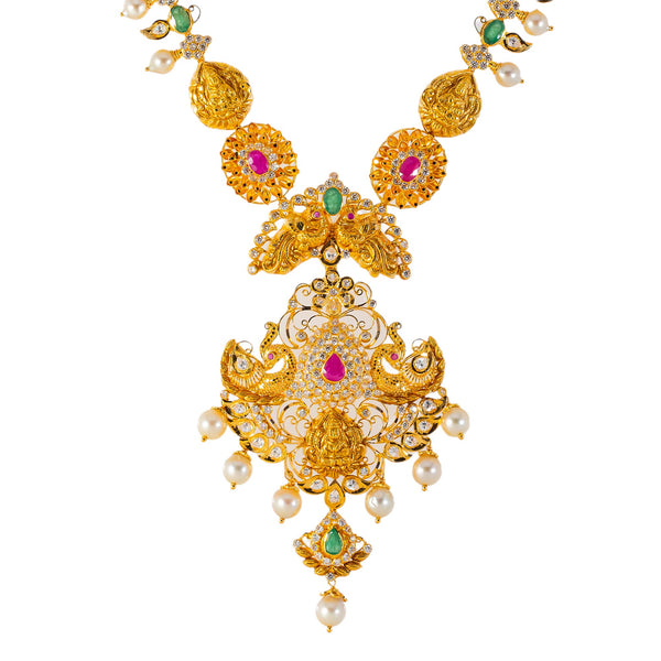 22k Yellow Gold, Gemstone, & Pearl Temple Necklace Set (93.7gm) | 


Virani Jewelers presents this opulent 22k gold necklace and earring set to adorn your neck and...