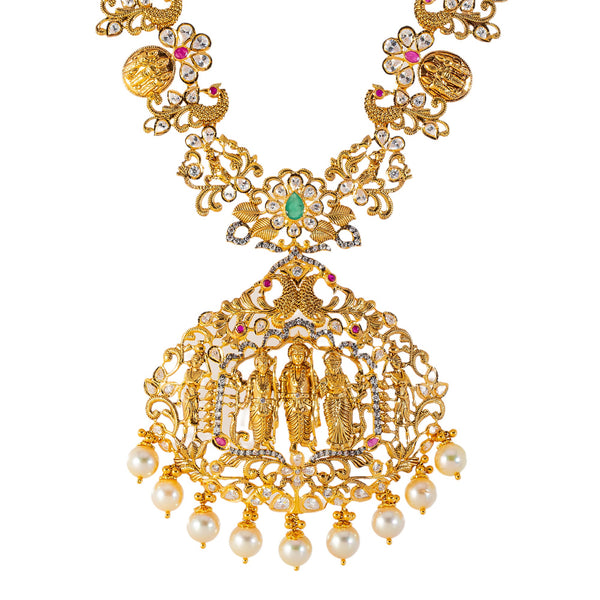 22k Yellow Gold, Emerald, Ruby, CZ & Pearl Temple Necklace (103.9gm) | 


Virani Jewelers presents this stunning 22k gold and gemstone necklace, a timeless expression o...