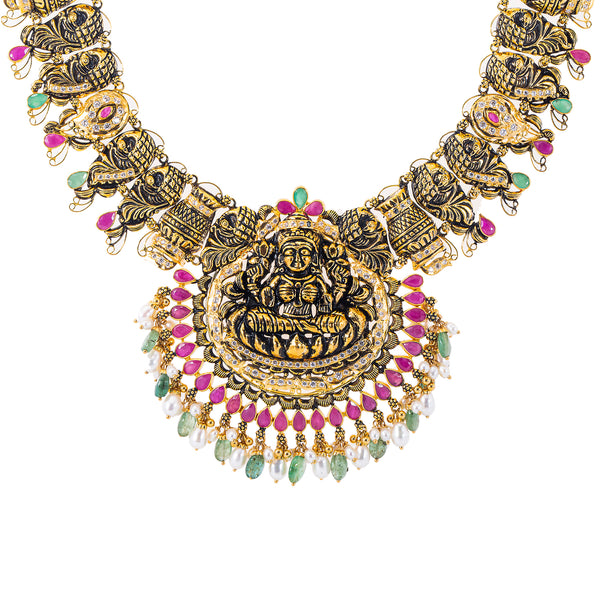 22K Antique Gold, Gemstone, Pearl & CZ Temple Jewelry Set (87.6gm) | 


Virani Jewelers' 22k antique gold and gemstone temple jewelry set, a true masterpiece of India...