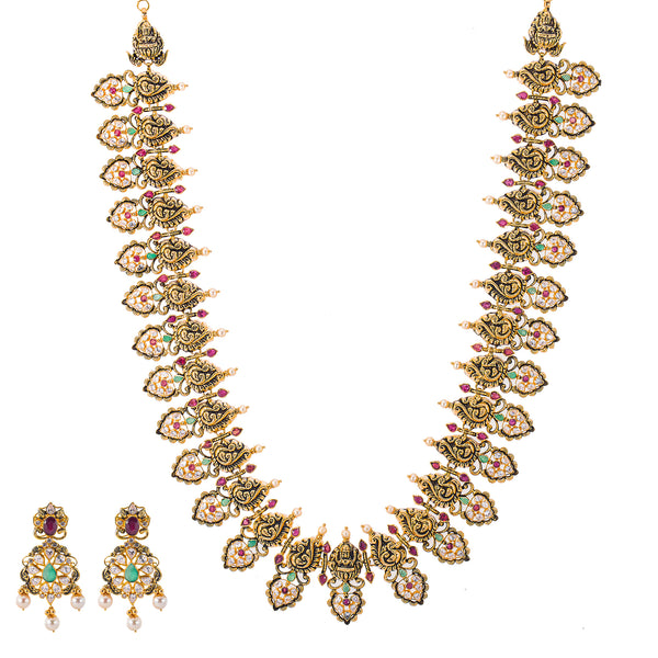 22K Antique Gold, Gemstone, Pearl & CZ Temple Jewelry Set (106.1gm) | 


Elevate your traditional or cultural looks with this stunning 22k antique gold and gemstone te...