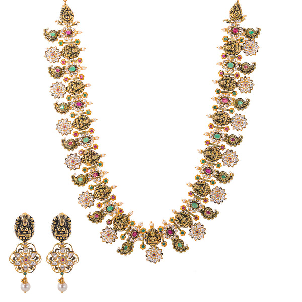 22K Antique Gold, Gemstone, Pearl & CZ Temple Jewelry Set (99.5gm) | 


Indulge in opulence with Virani Jewelers' 22k antique gold and gemstone temple jewelry Necklac...