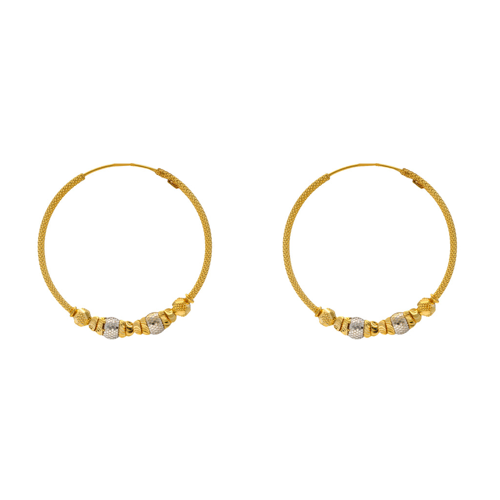 22K Yellow & White Gold Jhumka Hoop Earrings (7.5gm) | 


This dainty pair of 22k gold hoops earrings feature beaded details and white gold accents. The...