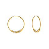22K Yellow & White Gold Jhumka Hoop Earrings (7.5gm) | 


This dainty pair of 22k gold hoops earrings feature beaded details and white gold accents. The...