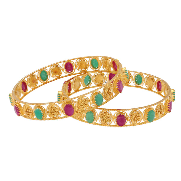 22K Yellow Gold Bangle Set of 2 w/ Emerald & Ruby (36.4gm) | 


Revel in the enchantment of these opulent Indian gold bangles, a fusion of traditional artistr...