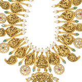 22K Yellow Gold, Gemstone & Pearl Laxmi Necklace (100.4gm) | 


Indulge in the allure of this 22k gold temple necklace by Virani Jewelers—a masterpiece that r...