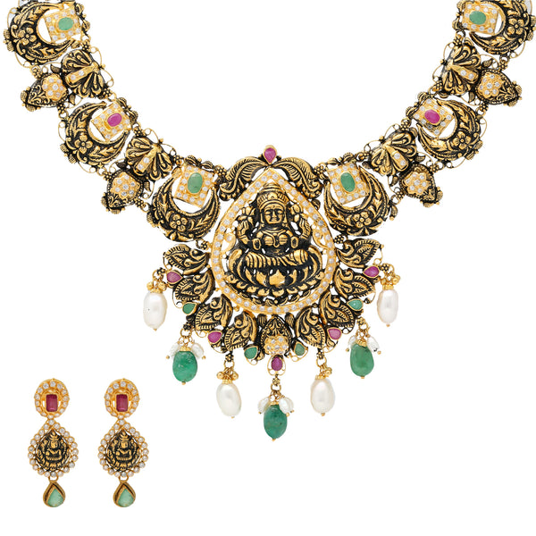 22K Antique Gold, Gemstone, CZ & Pearl Temple Jewelry Set (47.1gm) | 


Discover the epitome of grace and opulence with this 22k antique gold jewelry set by Virani Je...