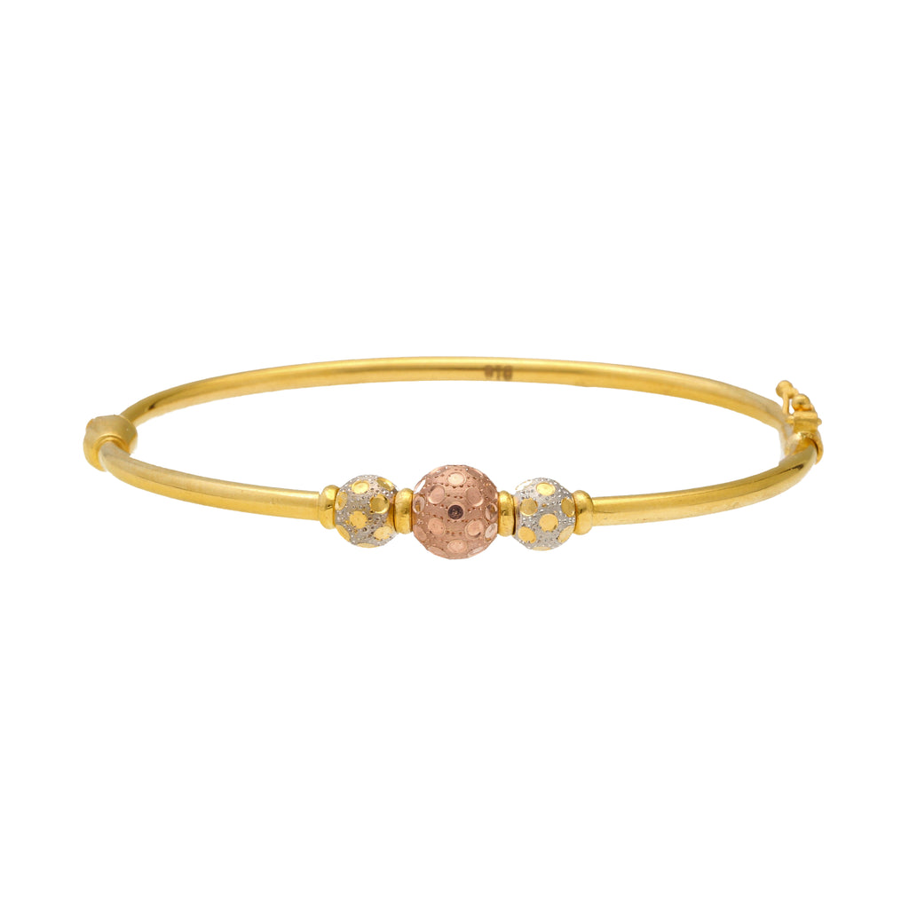 22K Multi-Tone Gold Ball Bead Bangle (10.3gm) | 


Virani Jewelers presents infinite glamour in the form of this 22k gold beaded bangle.   The tr...