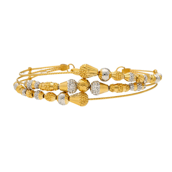22K Multi-Tone Gold Double Layer Beaded Bangle (15.5gm) | 


This 22k gold beaded bangle by Virani Jewelers is a golden serenade of minimal elegance.   The...