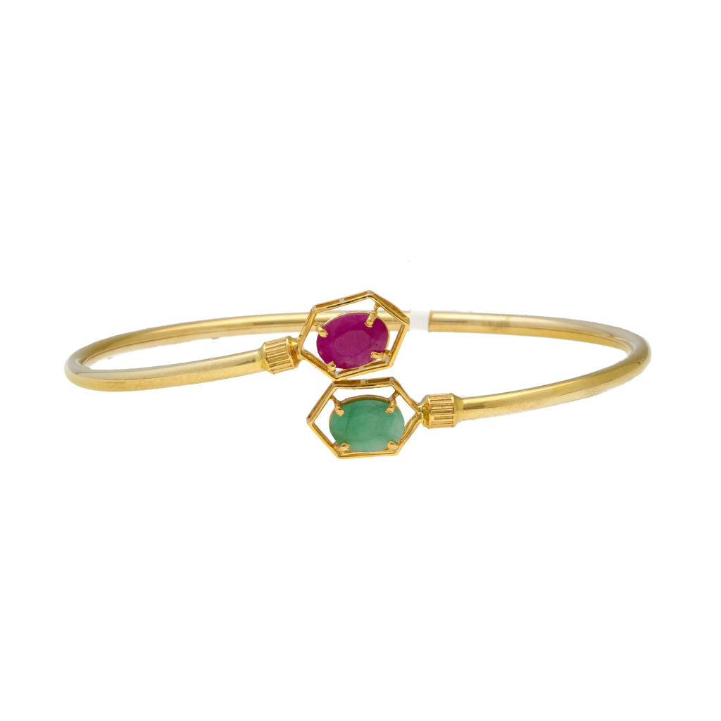 22K Yellow Gold, Emerald, & Ruby Bangle (8.2gm) | 


Embrace the chic simplicity of this 22k gold and gemstone bangle by Virani Jewelers.   The vib...