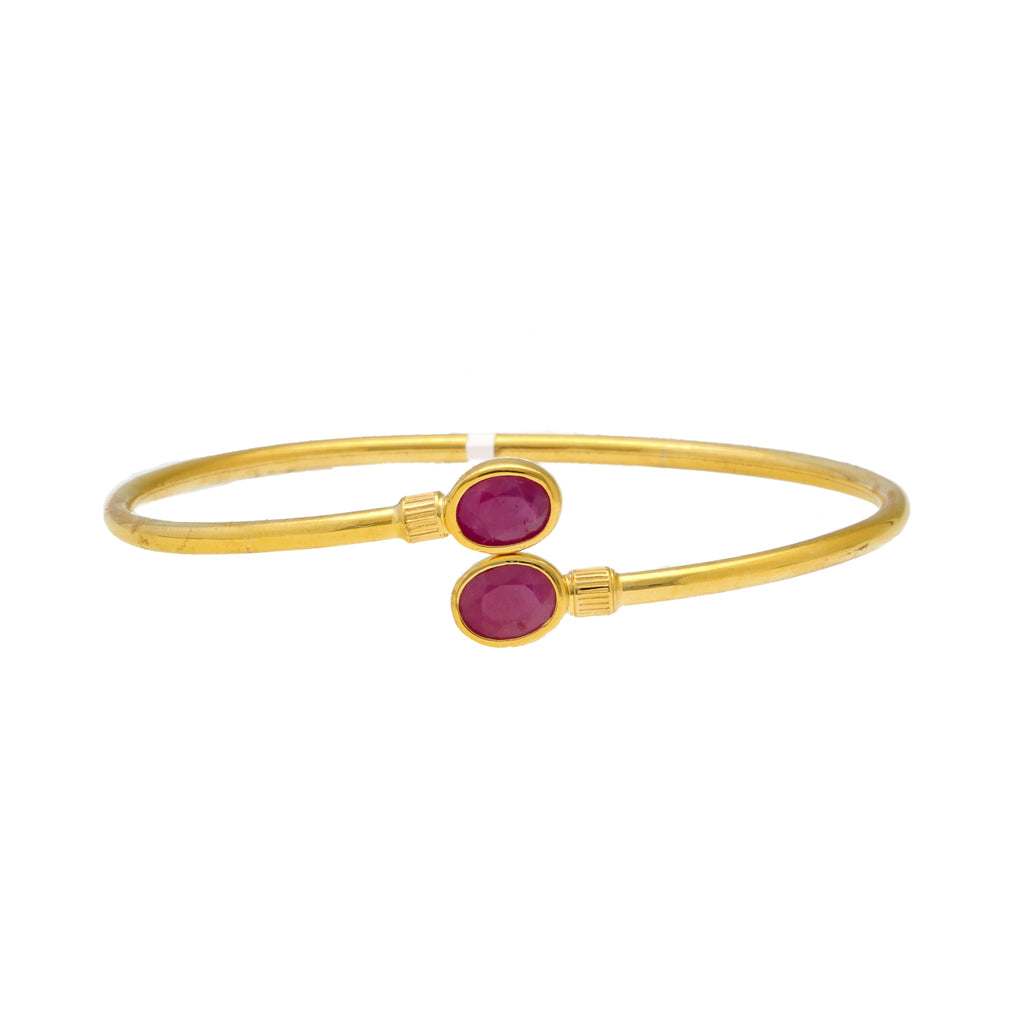 22K Yellow Gold, Emerald, & Ruby Bangle (8.6gm) | 


Virani Jewelers presents a display of brilliance with the 22k gold and ruby bangle.   The vibr...