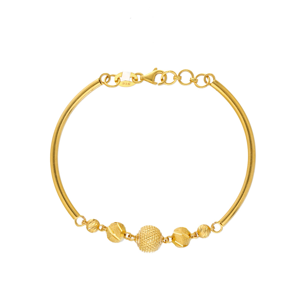 22K Yellow Gold Beaded Bracelet (7.1gm) | 


Allow this charmingly beautiful 22k gold beaded bracelet by Virani Jewelers to become a shinin...