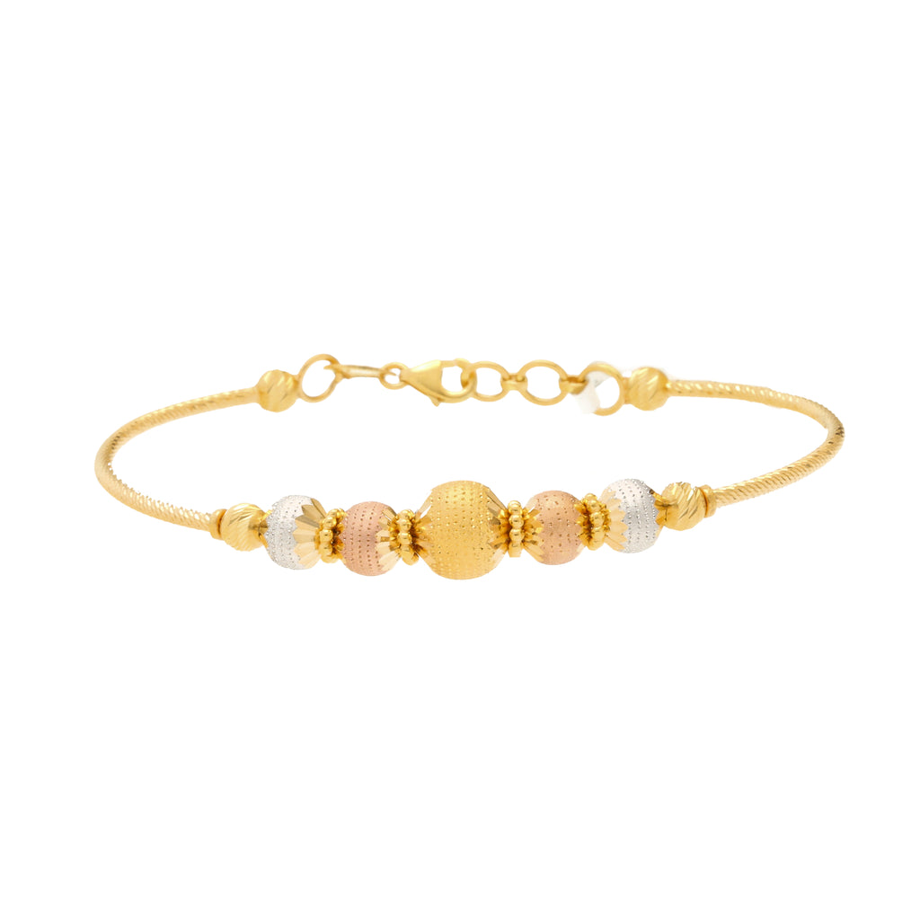 22K Multi-Tone Gold Beaded Bangle (10.9gm) | 


Elevate your wrist wear collection with this radiant 22k gold beaded bangle by Virani Jewelers...