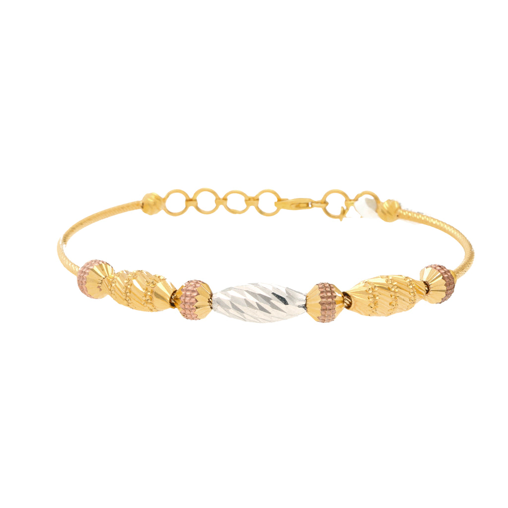 22K Multi-Tone Gold Beaded Bangle (12.6gm) | 


Embrace the allure of timeless sophistication with this 22k gold beaded bangle by Virani Jewel...