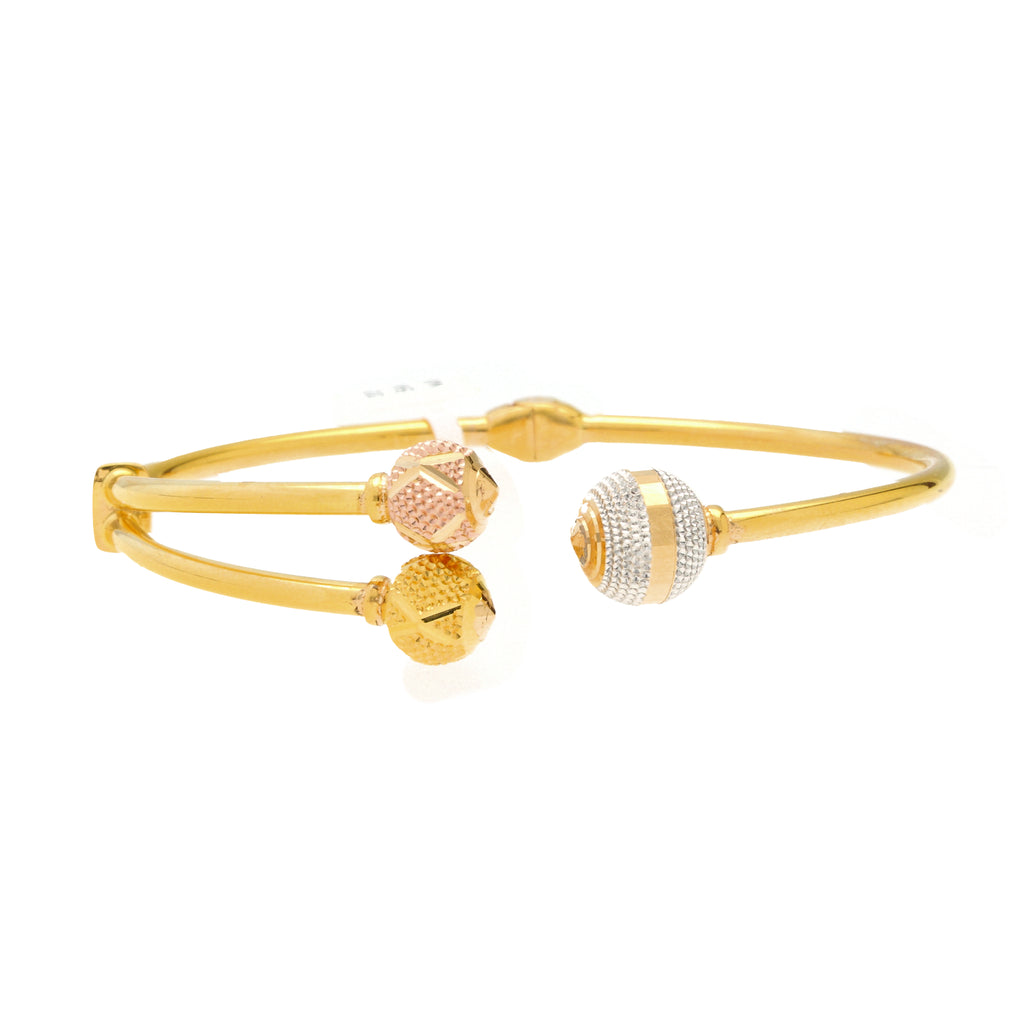 22K Multi-Tone Gold Ball Bead Bangle (11.3gm) | 


Revel in delicate opulence of this 22k gold beaded bangle by Virani Jewelers.   Crafted with p...