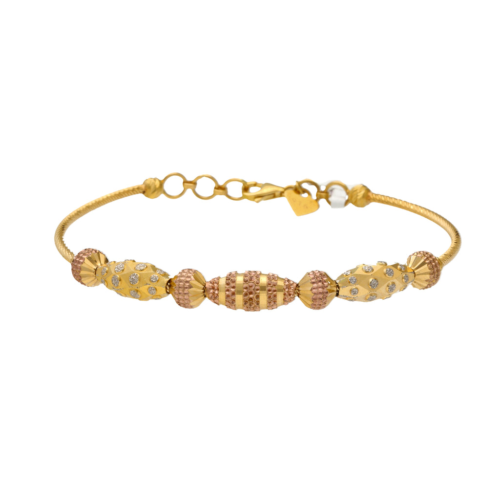 22K Multi-Tone Gold Beaded Bangle (13.1gm) | 


Adorn your wrist with grace and sophistication with this lovely 22k gold beaded bangle by Vira...