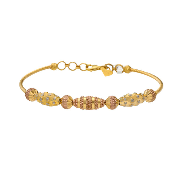 22K Multi-Tone Gold Beaded Bangle (13.1gm) | 


Adorn your wrist with grace and sophistication with this lovely 22k gold beaded bangle by Vira...