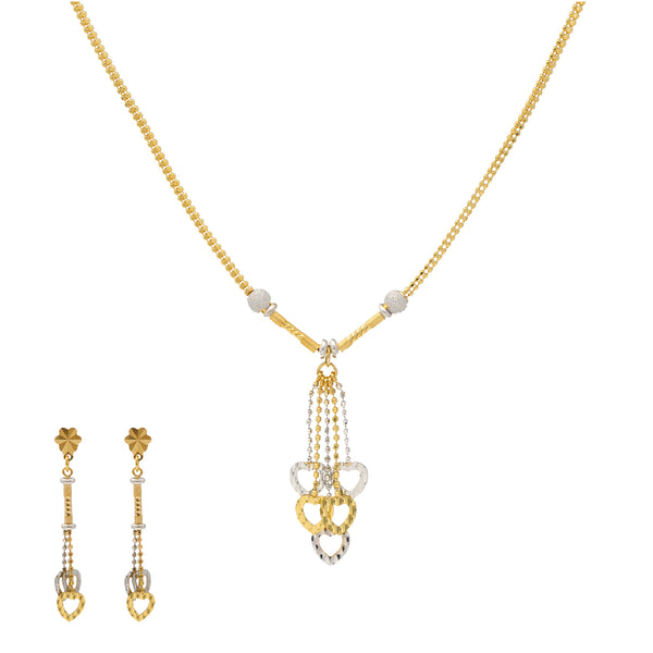 22K Yellow & White Gold Beaded Heart Necklace Set (12.7gm) | 


Indulge in the timeless allure of this 22k gold necklace and earring set by Virani Jewelers, a...