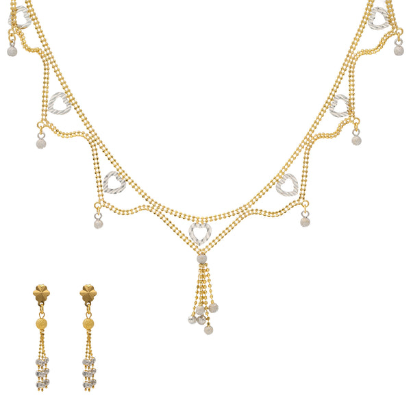 22K Yellow & White Gold Beaded Heart Necklace Set (14.2gm) | 


Unveil sophisticated radiance with this 22k gold necklace and earring set by Virani Jewelers—a...
