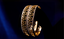 A pair of 22k yellow and white gold filigree bangles by Virani Jewelers