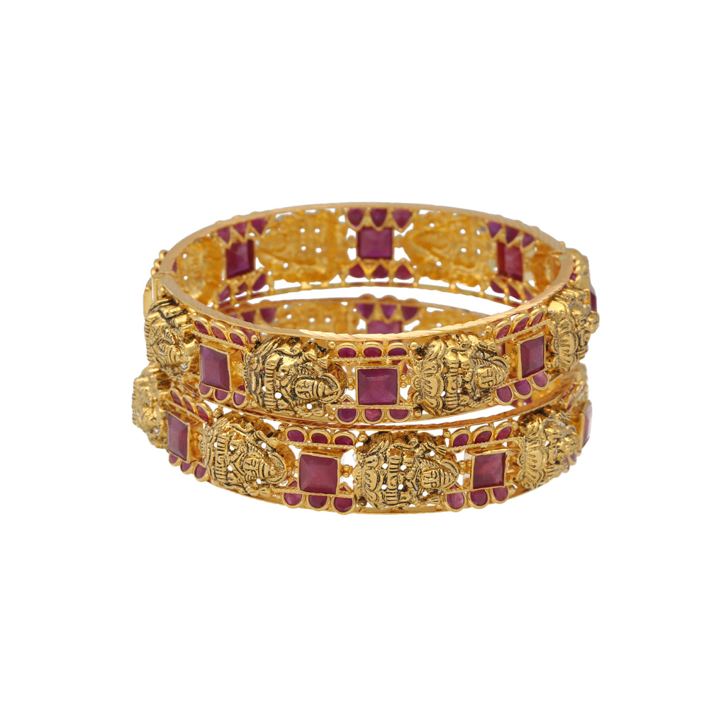 22K Yellow Gold & Ruby Temple Bangle Set (56.8gm) | 


Experience the allure of temple style Indian jewelry with our mesmerizing set of 22k yellow go...