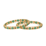 22K Yellow Gold & Emerald Antique Bangle Set (38.1gm) | 


Embrace the elegance of antique Indian jewelry with this captivating set of two 22k yellow gol...