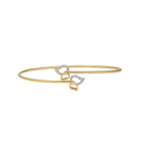 18K Yellow Gold & 0.14 Carat Diamond Bangle (4.1gm) | Elevate your look with the exquisite beauty of this 18k gold and diamond bangle by Virani Jeweler...