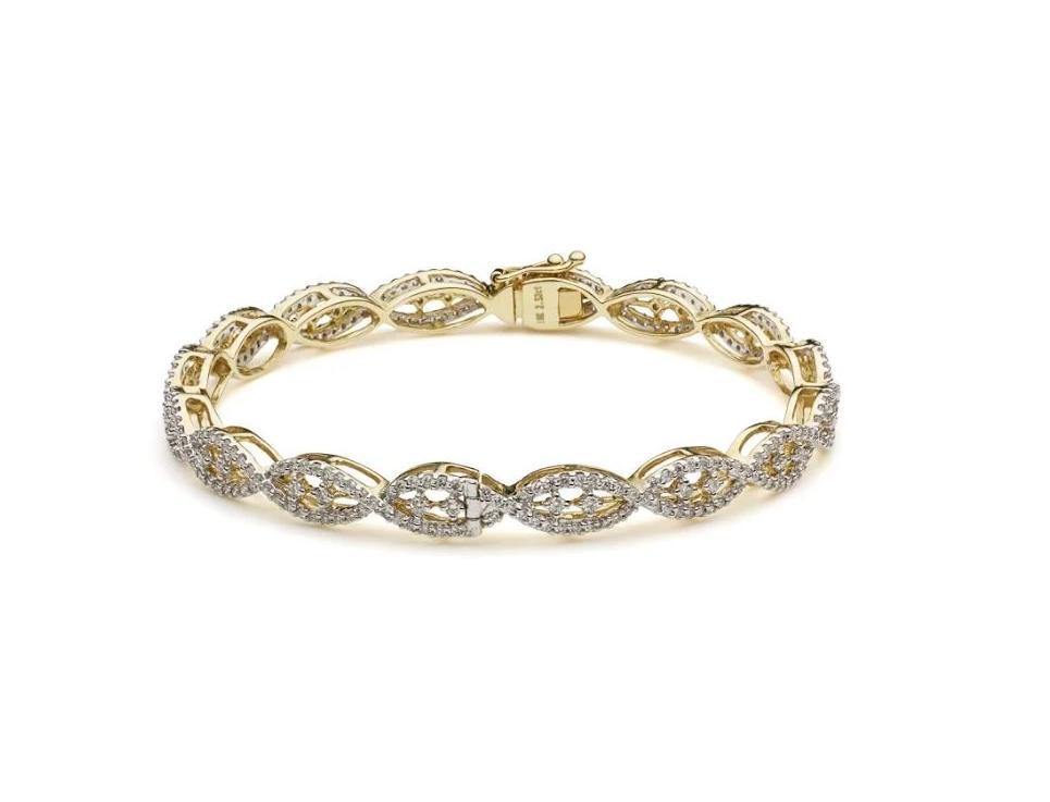 18K Yellow Gold Diamond Bangle W/ 2.48ct VVS Diamonds & Crossover Pattern - Virani Jewelers | Make a statement with your jewelry with pieces like this stunning 18K gold diamond bangle from Vi...