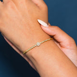 18K Yellow Gold Diamond Bangle W/ 0.76ct Diamonds - Virani Jewelers | Indulge in the guilt-free exploration of precious diamonds and gold of this exquisite women’s 18K...