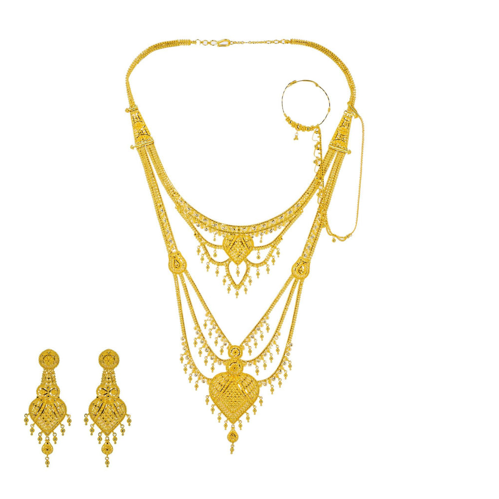 An image a 22K Indian gold necklace with nose ring and matching earrings from Virani Jewelers. | Go for the gold with this elaborately designed Indian gold necklace from Virani Jewelers!

Featur...