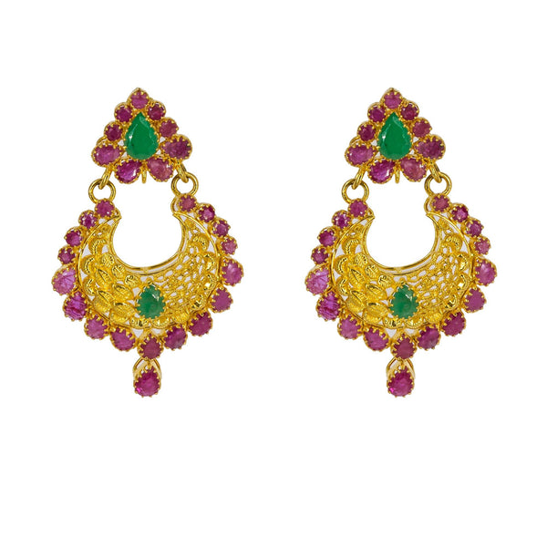 An image showing the emerald and ruby embellishments on the Indian gold earrings from Virani Jewelers. | Stand out from the crowd with this radiant 22K gold necklace and earring set from Virani Jewelers...