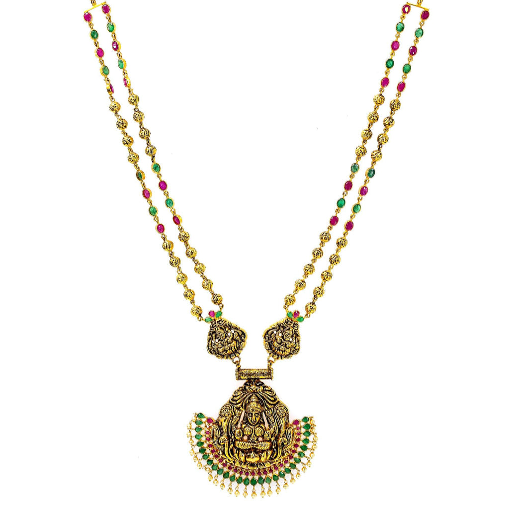 An image of a beautiful temple necklace with 22K antique yellow gold crafted by Virani Jewelers | Add the beauty of South Asian culture to your wardrobe with this gorgeous 22K yellow antique gold...