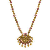 An image of a beautiful Indian necklace with gemstone accents from Virani Jewelers | Accessorize with elegant temple jewelry like this beautiful 22K yellow antique gold floral Laxmi ...