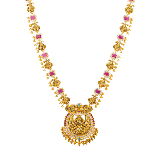 22K Yellow Gold, Gem, CZ, and Pearl Temple Necklace Set (75.4gm) | 


This 22k gold necklace and earring pair is simply a masterpiece. The artisanal style of the ch...