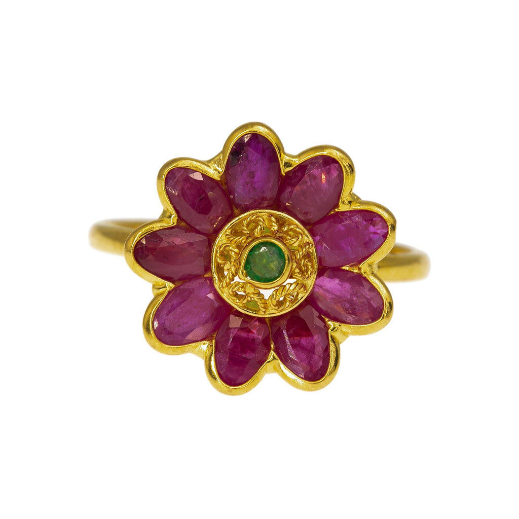 An image showing the rubies and emerald of the 22K gold flower ring from Virani Jewelers. | Make a statement with a 22K Indian gold flower ring from Virani Jewelers!

Features gorgeous rubi...