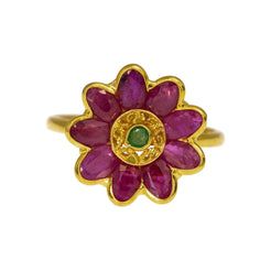 An image showing the rubies and emerald of the 22K gold flower ring from Virani Jewelers.