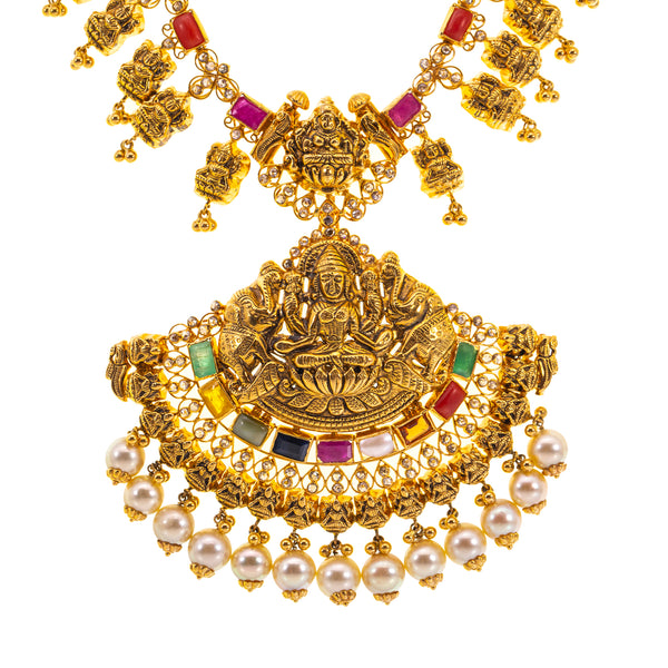 22K Yellow Gold, Uncut Diamond, Kundan, and Gemstone Temple Necklace (98gm) | 


The vibrant details of this 22k Indian gold necklace are simply exquisite. The colorful assort...