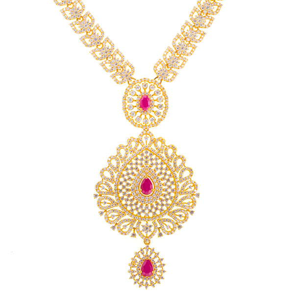 22K Yellow Gold, Ruby, & CZ Necklace (83.7gm) | 


Elegantly designed, this 22k gold necklace has a highly sophisticated look that is alluring an...