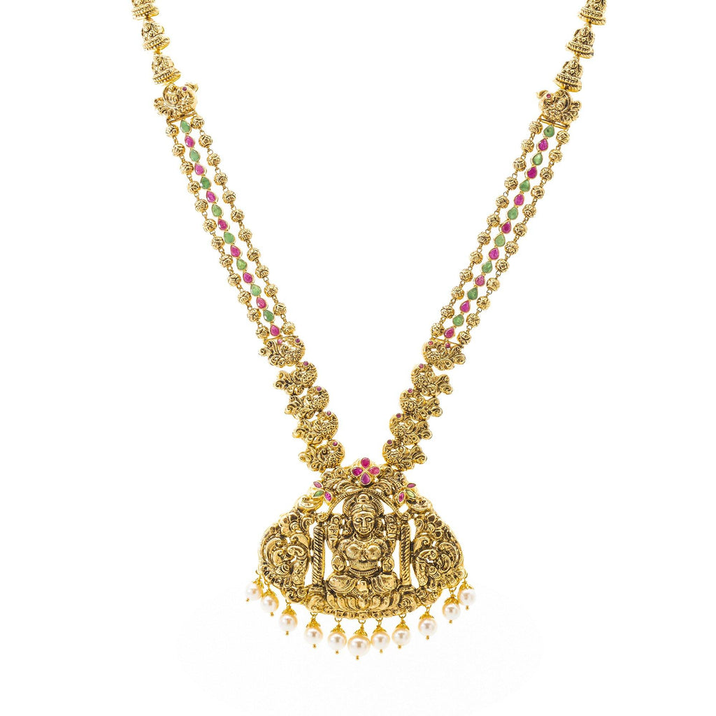 An image of the 22K gold necklace with a depiction of Laxmi from Virani Jewelers. | Celebrate your culture while making a statement with this beautiful 22K gold necklace from Virani...