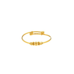 An image of the 22K gold bangle with an adjustable band and three gold beads and two spacers from Virani Jewelers.