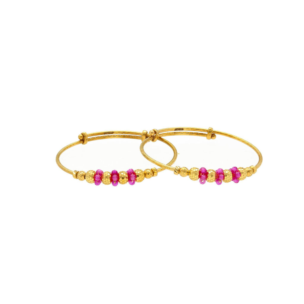 An image of the Virani 22K gold bangles with gold and ruby beads and an adjustable band. | Help your little one celebrate their culture with these 22K gold bangles from Virani Jewelers!

D...