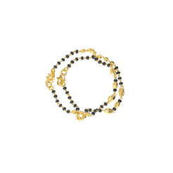 An image of the Avery 22K gold bracelet with black beads from Virani Jewelers.