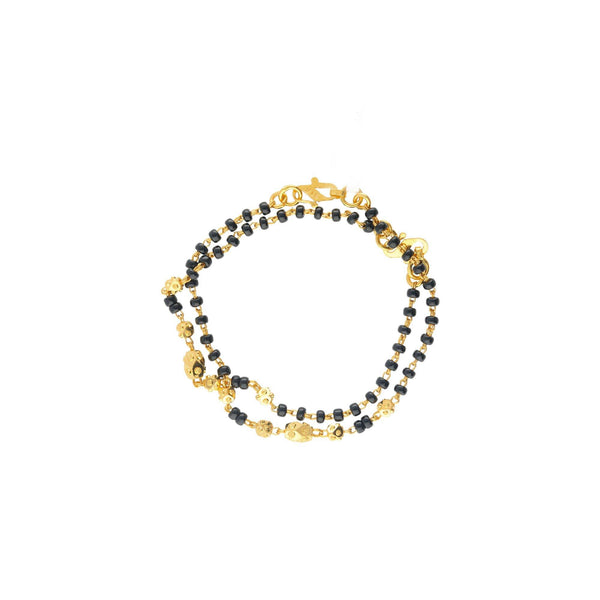 An image of the Kendall 22K gold bracelet with black beads from Virani Jewelers! | Let your child show off their sense of fashion with the Kendall 22K gold baby bracelets from Vira...